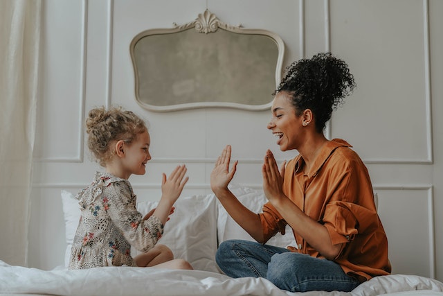 mother and child playing