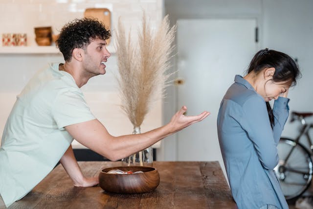 man and woman arguing