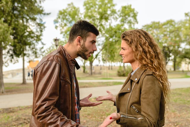 couple fighting in park